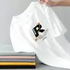 Camisetas de Manga Corta Impresas en Inglés Estilo Retro Americano para Hombres y Mujeres, Tops de Verano Holgados de Marca de Moda para Parejas, Manga Media