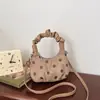 Bolso de nube de lunares estilo explosivo transfronterizo bolso cruzado dulce retro bolso de mano con sentido de diseño de nicho bolso de hombro mujeres al por mayor