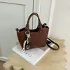 Bolsa Pequeña de Mano Súper Caliente Esenciales de Oficina para Mujer 2026 Nuevo Verano Gama Alta para Viajar al Trabajo Bolso Cubo de Hombro Cruzado