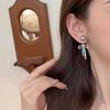 Pendientes largos con borlas y lazo de perla gris de sensación fresca para mujer, pendientes de amor, nuevo estilo 2024, pendientes de temperamento atractivo