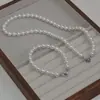 Botón de presión de acero inoxidable Collar Pulsera Cadena para suéter de perlas que no se decoloran Cadena de nácar redonda blanca australiana de alto brillo