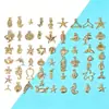 Colgantes de aleación de zinc con forma de concha de oro KC mezclado, estrella de mar, caracola, accesorios para pulsera de colgantes hechos a mano para DIY