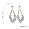 Nuevos pendientes de plata con aguja europea y americana con diamantes, pendientes de borla con forma de gota de agua ovalada, exquisitos y lujosos con un toque de alta gama, pendientes de nicho