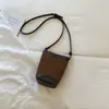 Bolso de hombro de color block de moda, nueva colección otoño 2026, bolso de mano de diseño nicho, bolso tipo cubo elegante y único