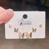 Elegantes aretes de plata con delicados zircónes de mariposa, juego de tres pares. Exquisito conjunto de pendientes de moda estilo coreano