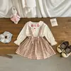 Falda plisada a cuadros para niña 2026 Nuevo Otoño Estilo Coreano Vestido con tirantes para bebé niña Atuendo de dos piezas de moda