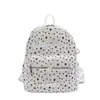 Mochila nueva estilo coreano 2026 con estampado de estrellas, gran capacidad, ligera, versátil, adecuada para estudiantes, con un lazo de encaje