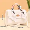 Bufanda de seda con rayas de diamante candado redondo bolso cuadrado pequeño 2026 estilo coreano bolso de mano pequeño comercio exterior al por mayor bolso de moda moderno