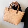 Bolso tejido de verano para mujer 2022, nuevo bolso de moda de gran capacidad para mujer, bolso de paja simple, bolso de cubo portátil