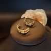 Pendientes de cobre en forma de U de alta calidad con incrustaciones de circonita y pequeñas flores de diamantes de colores mixtos, diseño de nicho femenino, joyería de moda con temperamento para el día a día, venta al por mayor