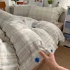 Juego de cuatro piezas estilo minimalista Clase A de algodón puro, estilo simple de botones ins, juego de tres piezas de funda nórdica a cuadros para dormitorio de algodón gofrado lavado