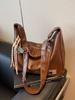 Bolsa de Viaje de Gran Capacidad para Comercio Exterior para Mujer Primavera y Verano 2025 Nueva Casual Nicho de Hombro Cruzada Bolsa Dumpling para Combinar con Todo