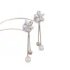Brincos de Borla com Flor Estilo Longo 2025 Novos Brincos de Luxo Acessível Círculo Elegante Super Fada Pequenos Frescos Brincos