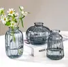 Vaso transparente pequeño fresco ins recto redondo boca fina mini vidrio flor mesa de centro mesa de centro decoración fabricantes al por mayor