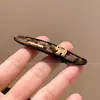 Elegante pinza para el pelo floral con estampado de leopardo para mujer, con un aire Maillard, pinza de cocodrilo estilo coreano, pasador, accesorio para el pelo de otoño e invierno