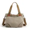 2026 Moda Coreana Versátil Casual Bolsa de Ombro Transversal Nova Retro Tendência Casual Bolsa de Lona para Mulheres