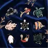 Broche de estilo marino con personalidad, diseño de nicho, joyería para chaqueta de mujer, abrigo, alfiler pequeño fijo, accesorios para traje de hombre.