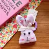 Corea del Sur lindo niños grande tela algodón cuadros enchufe algodón animal de dibujos animados cabeza pato clip corbata de moño aro grande para el pelo