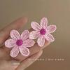 Aretes de isla hechos a mano de girasol de rafia y pasto, aretes de flores grandes exagerados de personalidad junto al mar, venta al por mayor de aretes