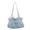 La popular bolsa de cubo fresca de mano para mujer de este año, nuevo estilo de verano 2026, bolso de hombro único plisado de lunares, bolso versátil para el antebrazo