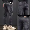 Jeans Masculino de Cintura Alta Tendência Marca de Luxo Corte Reto Solto Primavera/Outono 2026 Novo Versátil Elástico Casual Calça Longa