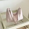 Bolso texturizado popular de este año para mujer, nuevo modelo de verano 2026, bolso de hombro simple de color liso, bolso cruzado para el día a día