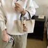 Nuevo bolso de hombro para mujer, bolso de mano de gamuza a la moda, bolso tipo cubo otoño 2026 con toque vintage, gran capacidad para el trabajo