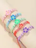Europa y Estados Unidos popular pulsera de flor de arcilla blanda cuerda de mano tejida a mano joyería de moda simple de comercio exterior ajustable al por mayor