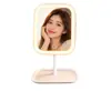 Espejo de maquillaje LED de escritorio para mujer, espejo pequeño regulable, soporte de escritorio para dormitorio, espejo de belleza portátil de pie con base de almacenamiento