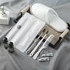 Artículos de tocador de Star Hotel, Juego de pantuflas de cerdas suaves especiales para hotel B&B al por mayor, Cepillo de dientes desechable con pasta de dientes