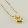 Venta Caliente Transfronteriza 26 Collares en Inglés A-Z Letra Gruesa Cadena de Serpiente Redonda Chapado en Cobre Oro de 18K Colgante de Letra Burbuja para Mujer