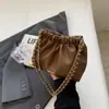La bolsa popular de este año para mujer Nueva 2023 de alta calidad color sólido textura nicho bolso de hombro cadena bandolera bolso cubo