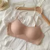 Versão com decote baixo e mais grossa! Roupa íntima invisível sem costura para mulheres com seios pequenos, realçando e aumentando o busto, com alças finas e um design estilo quadrinhos