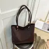Bolso de axila tejido vintage de gran capacidad para mujer, nuevo modelo 2026, bolso tote de alta gama para el trabajo y los desplazamientos, bolso de mano y bolso de hombro
