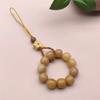 Cadena para teléfono móvil de bodhi de boutique natural hecha a mano DIY torsión manual tallado estilo nacional joyería de llavero chino al por mayor
