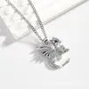Joyas de comercio exterior al por mayor nueva personalidad forma de dragón de dibujos animados con diamantes de imitación collar colgante para parejas de damas