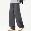 Pantalones de chándal retro minimalistas de pierna curva, nueva colección otoño/invierno para hombre, con un corte relajado y holgado, y diseño de pierna ancha para un look cómodo y casual. Disponible en tallas grandes