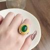 Anillo vintage occidental imitación oro arena perla artificial proceso de oro de estaño hueco vidrio verde proceso de moneda europea