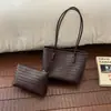 Bolsa de mão feminina com padrão trançado retrô transfronteiriço 2026 novo verão simples versátil bolsa tote mãe-filha