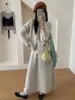 Conjunto de tricô estilo delicado 2026 Outono/Inverno Novo Conjunto de Três Peças: Camisola de Renda Patchwork + Cardigã + Saia