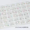Dongzhou Rosa Sakura Recubierto Accesorios de Pedrería para Uñas Roca Dulce Corazón Retorcido Vidrio Puntiagudo Pedrería Brillante Adhesivo para Uñas Pedrería