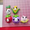 Perro de orejas negras de dibujos animados accesorios de resina de frutas diy pegamento de crema funda de teléfono horquilla tocado hebilla de zapato llavero colgante