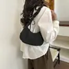 Bolsa de axila de nailon con cordón estilo francés en stock, modelo nuevo 2026, bolso de hombro de color liso fresco, bolso casual versátil y moderno
