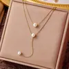 Collar de acero de titanio chapado en oro de lujo ligero y sin decoloración, cadena de clavícula con lazo de moda versátil para mujer, fabricantes