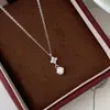 Colar Trevo de Quatro Folhas Cravejado com Diamantes em Prata de Lei S925 para Mulheres Design Japonês Retro de Nicho Sensação de Alto Padrão Anel Bestseller do Little Red Book