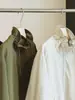 Elegante chaqueta de manga larga con cuello alto y cierre de cremallera para mujer, nueva colección de otoño, corte holgado, versátil, rejuvenecedora y elegante, con cordón y longitud corta.