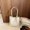 Bolso retro de moda para mujer de gran capacidad 2026, bolso tote tejido de verano simple para el hombro, elegante para el trabajo y los desplazamientos