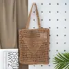 Comercio exterior transfronterizo bolso de mano para mujer diseño hueco gran capacidad bolsa tejida estilo retro bolso de playa para vacaciones al por mayor