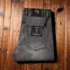 Estación europea primavera y verano fino importado mezclilla lavado a piedra molino gris ahumado elástico recto ajustado delgado jeans moda hombre