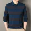Camiseta Popular de Algodão 65 Manga Longa com Bolso Masculina Primavera e Outono Nova Camisa de Base Listrada Casual para Homens de Meia-Idade